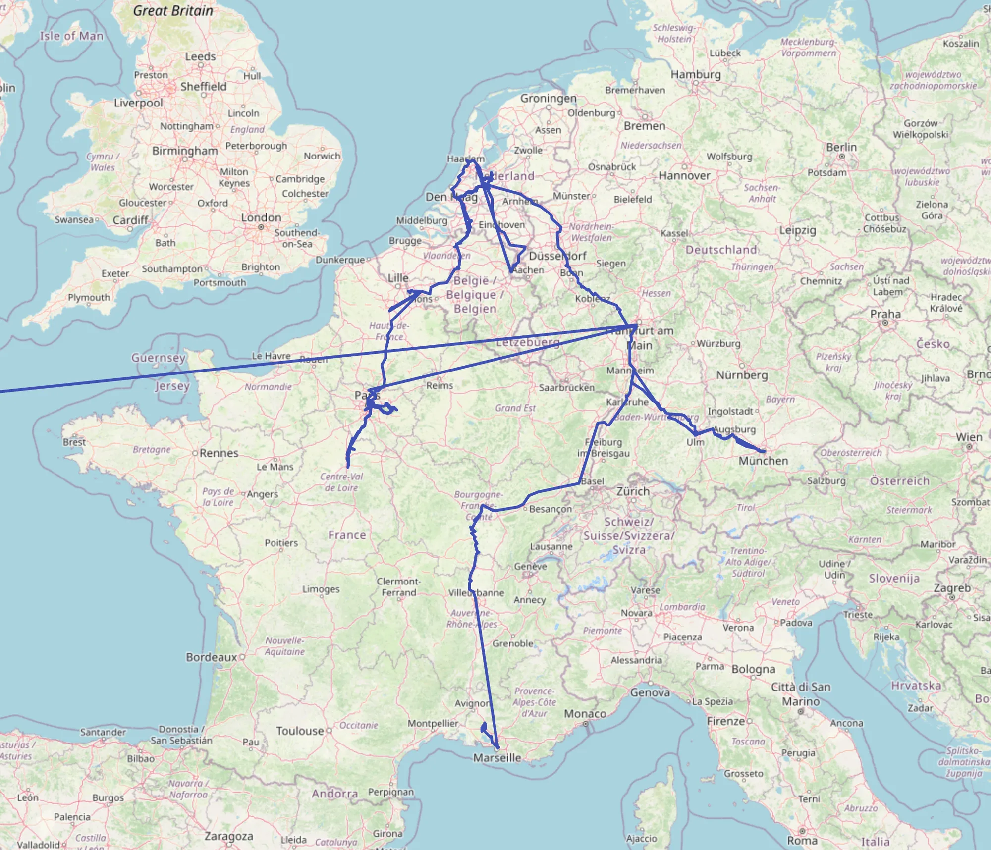 Map of Western Europe with a blue GPS track linking Paris, Amsterdam, Frankfurt, Munich, Marseille, and a line exiting west.